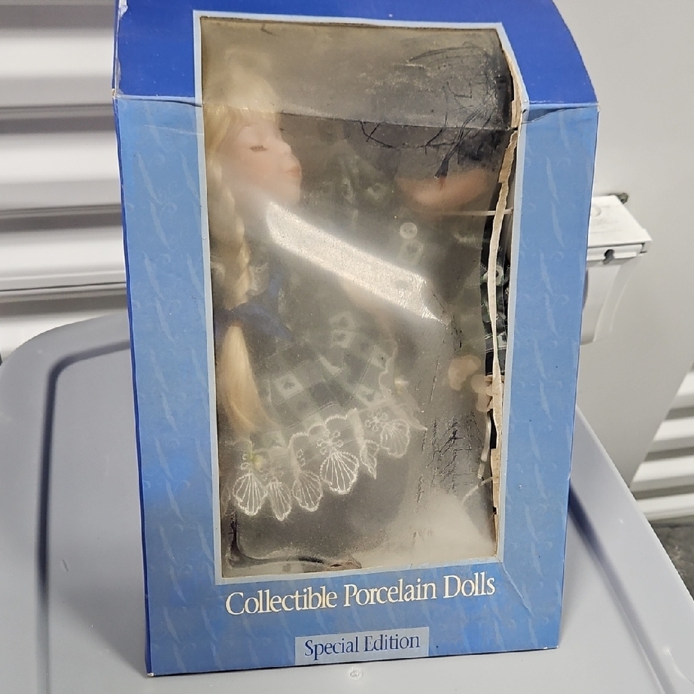 Collectible Porcelain Doll in Blue Dress